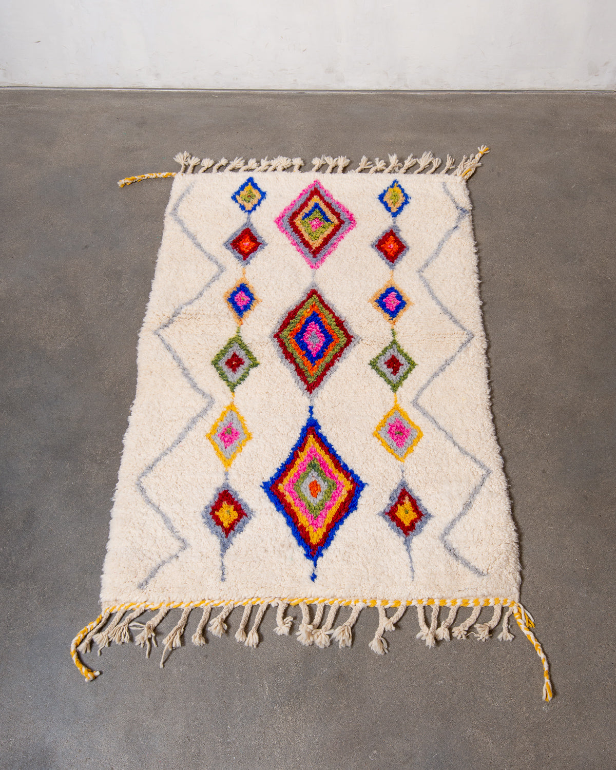 Modern, designer, handcrafted Berber rug from Morocco. Beniourain carpet with beautiful colours and patterns and fluffy wool texture.
